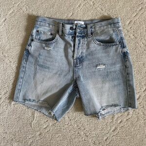 Light wash jean shorts with distressing